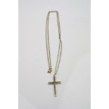 9ct yellow gold cross pendant, length approximately 3.5cm on a 9ct fine belcher link chain, length