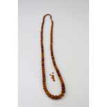 Amber bead graduated necklace, the smallest bead measuring approximately 3.5mm x 2.5mm, the