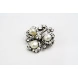 Victorian diamond and pearl brooch modelled as a clover leaf, the principle round old cut diamond