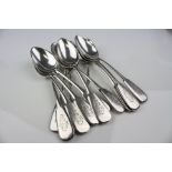 Twelve Russian silver fiddle pattern dessert spoons, engraved monogram to terminal, combine city