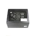 An Automatic watch winder display box with room to wind four watch and display a further six