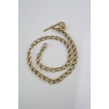 18ct yellow gold curb link Albert chain with 18ct gold T bar, toggle and two bolt rings, each link
