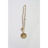 9ct yellow gold St Christopher pendant, diameter approximately 18mm, on 9ct fine link chain,