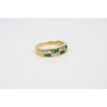 Emerald and diamond 18ct yellow gold ring, comprising eight square mixed cut emeralds and twelve