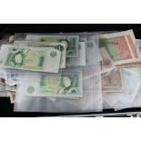 A silver flight case containing a mixed assortment of GB & World banknotes including a quantity of