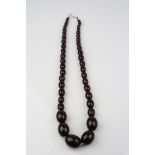 Art Deco cherry amber Bakelite bead necklace, graduated beads the largest measuring approximately