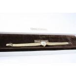 Girard Perregaux 9ct gold cased ladies wristwatch, champagne dial with black enamelled baton