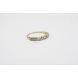 Diamond half eternity yellow gold platinum set ring (hallmarks rubbed), nine small eight cut