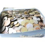 Tin of mixed world coins to include silver examples.