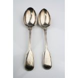 Pair of Victorian silver table spoons, fiddle and thread pattern with crested terminals, makers