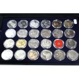 A large collection of commemorative UK Commonwealth & World coins to include silver proof coins,