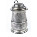 George II large silver tankard raised on moulded circular foot, the bulbous body with engraved crest