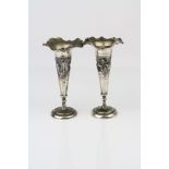 Pair of white metal silver trumpet vases, repoussé lion and elephant African scene, tapered