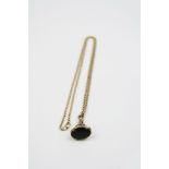 Onyx 9ct yellow gold fob, length approximately 3cm, on 9ct yellow gold belcher link chain, length