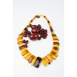 Amber and clarified amber fringe necklace, comprising various shades of amber, bakelite screw clasp;