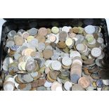 A black cash tin containing a large quantity of GB & World 20th century coins including Swiss &