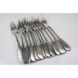 Twelve Russian silver fiddle pattern forks, monogrammed terminals, kokoshnik marks and makers marks,