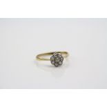 Yellow diamond 18ct yellow gold platinum set flower head cluster ring, the central round brilliant
