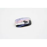 Aksel Holsen Norwegian enamelled silver brooch, depicting a moose in fjord scene, hinged pin and