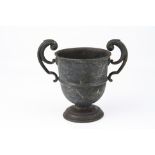 Silver twin handled trophy cup, scrolled handles, moulded circular foot, hallmarks indistinct,