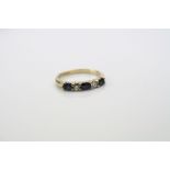 Sapphire and diamond five stone 18ct yellow gold ring, three oval mixed cut blue sapphires, two