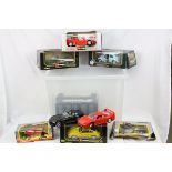 Seven boxed Burago diecast models to include 5 x 1:18 (3035, 3060, 3036, 3352 & 3028), and 2 x 1: