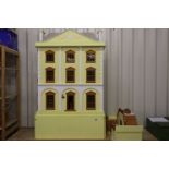 Large contemporary dolls house in the Edwardian style with a large quantity of dolls house furniture