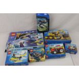 Seven boxed Lego sets to include Toy Story 7593, City x 4 (7248, 3365, 7634 & 3178), Atlantis 8056