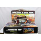 Three boxed Scalextric items to include C221 Accessory Set, Mighty Metro with both slot cars and