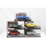 Five cased Carrera Evolution slot cars to include 25736 Aston Martin DB5 Historic Racer, 27101