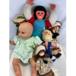 Seven soft toys and dolls to include a Jacko Monkey, German dolls etc