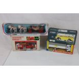 Four boxed diecast models to include Corgi Tronics Rapid Intervention Firefighter 1001, Dinky 940