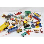 Quantity of metal and plastic farming implements and accessories to include Britains,