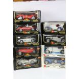 Nine boxed Burago 1/18 diecast models to include 3007 Ferrari 250 Testa Rossa (1957), 3016 Jaguar