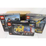 Three boxed Lego Technic sets to include 42024 Container Truck, 42053 Volvo EW160E and 42108