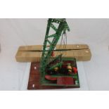 Scratch built Mecccano lever system on wooden base plus a quantity of additional green Meccano