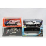 Four cased slot cars to include Special Edn Pioneer Street Muscles Dodge Charger, Revell Jaguar E-