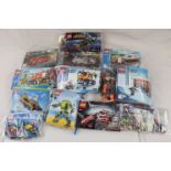 12 Lego sets in bags with instructions, mainly City examples, unchecked