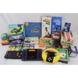 Group of electronic games, puzzles, and card games to include Arcade Defender hand held game,