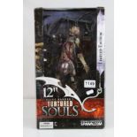 Boxed ltd edn McFarlane 12" Clive Barker's Tortured Souls Talisac firgure, complete and appearing