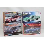 Four boxed Monogram Snap Tite model kits to include 1097 Shelby Cobra 427 (sealed), 1043 Blue Max