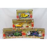 Four boxed Britains gold models to include 9913 JCB Excavator, 9920 Skip Lorry, 9923 British Telecom