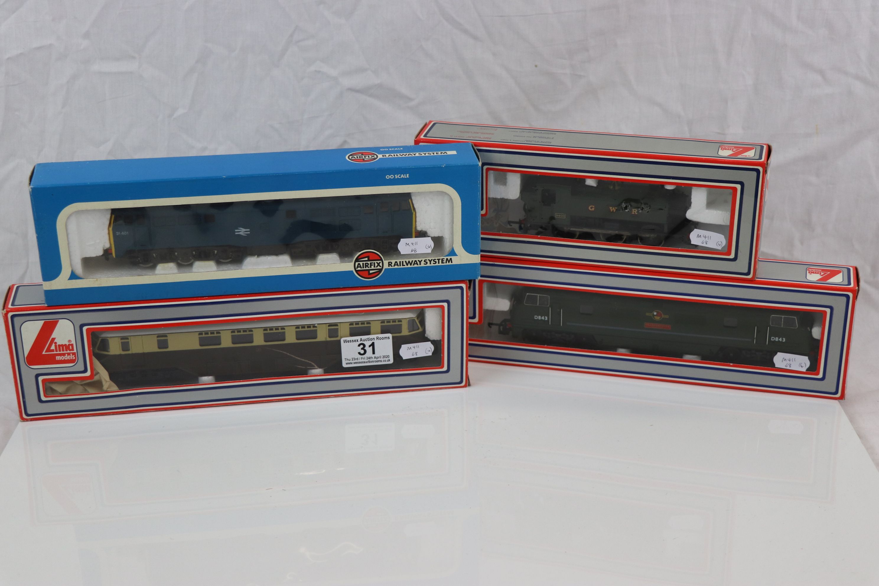 Four boxed OO gauge locomotives to include 3 x Lima (205135MWG Sharpshooter, 205117MWG GWR0-6-0 &