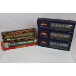 Five boxed OO gauge items of rolling stock to include Bachmann Blue Riband x 3 (39280, 29320 &