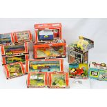 Nine Boxed Britains Farm Implements to include 9539 Seed Drill, 9563 Hay Baler, 9535 Muledozer, 9534
