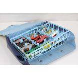 24 Original Matchbox Lesney diecast models contained within a tatty Matchbox carry case, condition