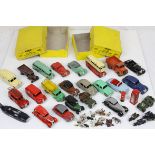 25 Mid 20th C Dinky play worn diecast models to include Hillman Minx, Austin Atlantic, ESSO Trojan