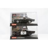 Two cased Carrera Evolution slot cars to include 25715 Evolution Dodge Charger 500 Street Version