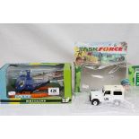 Two boxed Britains models to include 9611 Hughes 300C Police Helicopter and Task force 7608 White UN