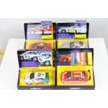 Four boxed ltd edn Scalextric slot cars to include C2487A Skoda Fabia WRC Works, C2560A Peugeot
